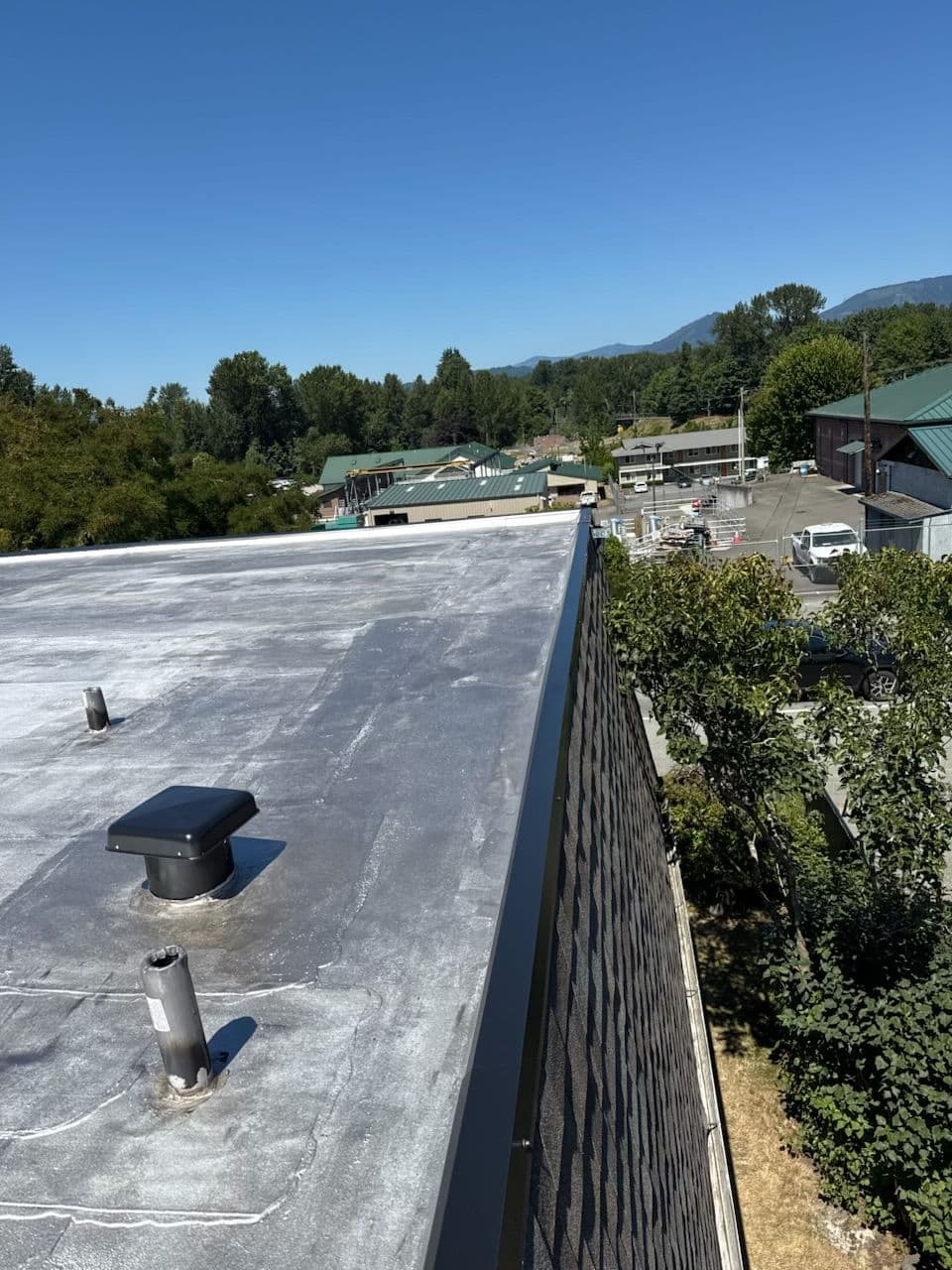 Gallery photos for Expert Flat Roof and Shingle Roof Transformation: Image #3