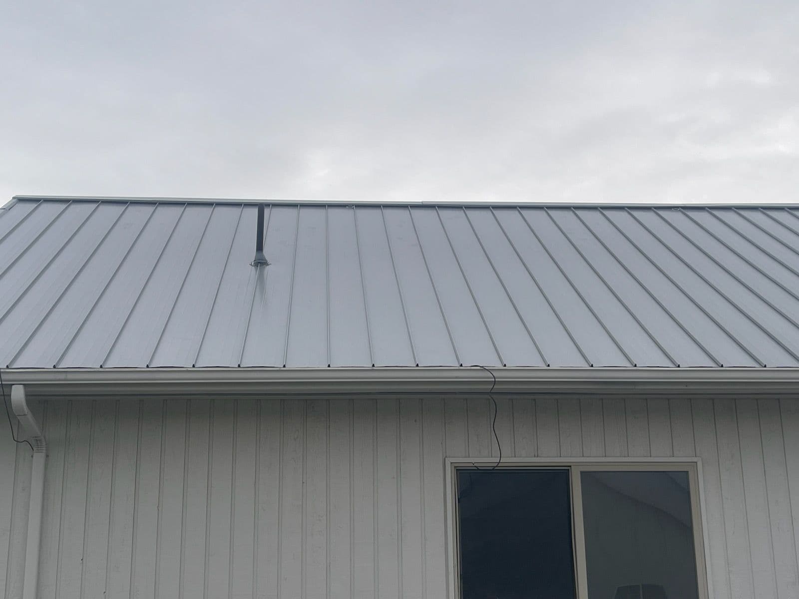 Gallery photos for Stylish Gray Metal Roof Enhances Home Resilience: Image #2